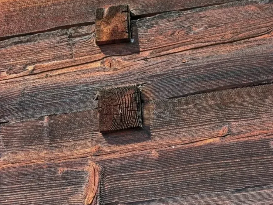 Sun-weathered traditional wall planks (lozbe)